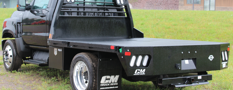 CM Truck Beds - Packer City & UP International Trucks